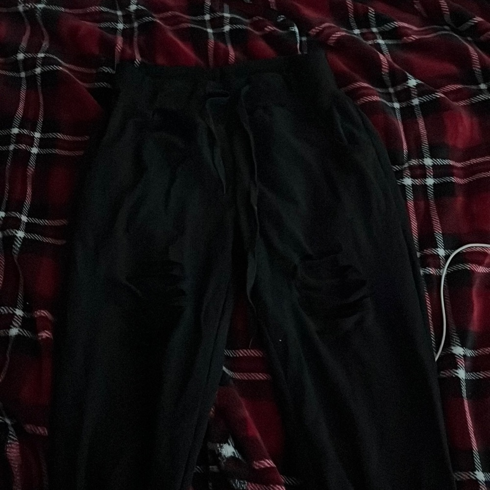 ripped black sweat pants